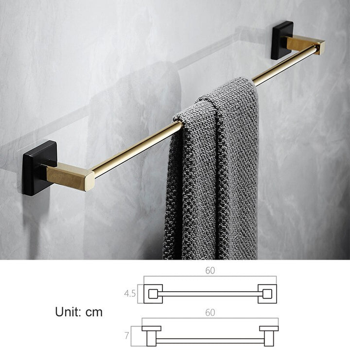 Black with gold polished bathroom accessories