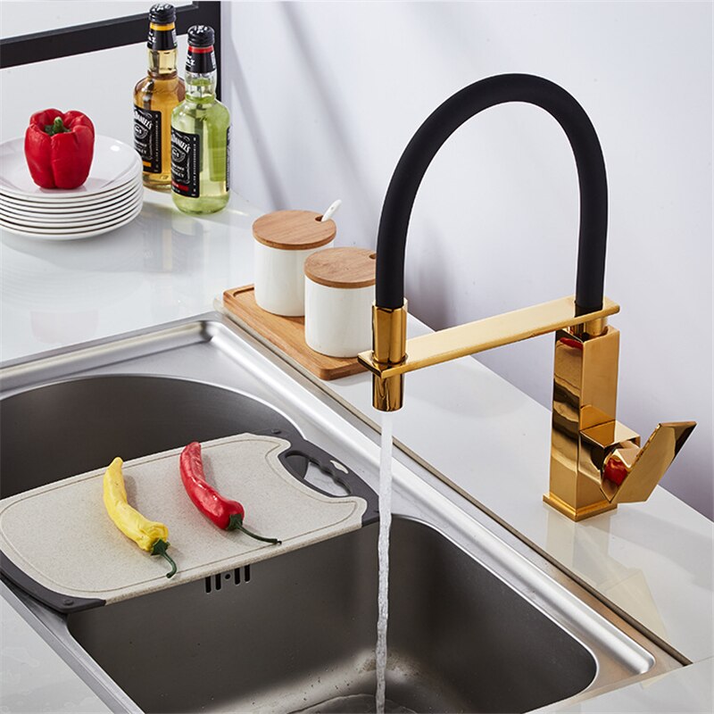 Gold polished kitchen faucet with dual sprayer