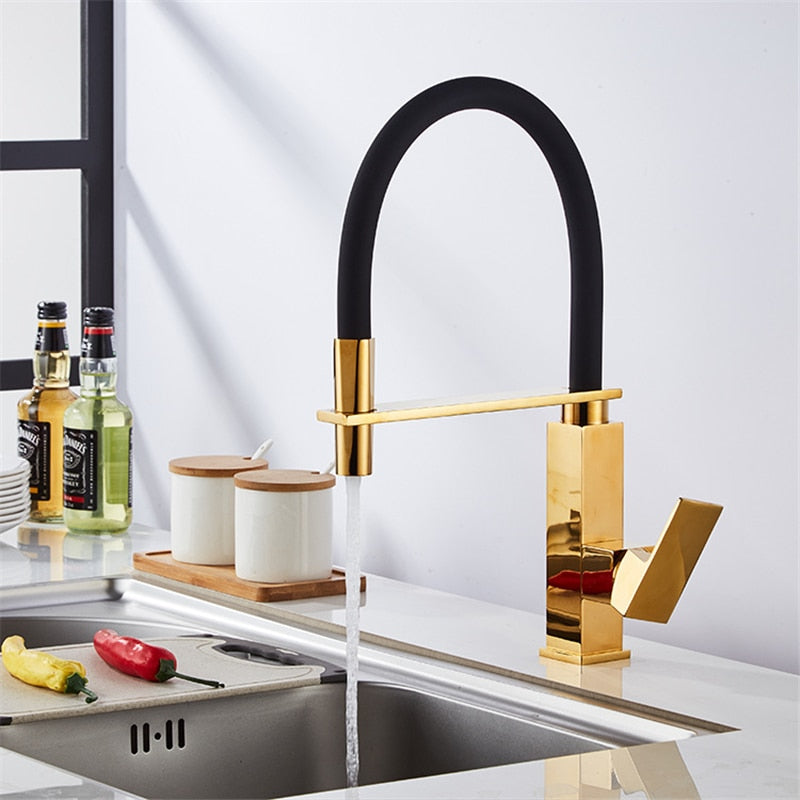 Gold polished kitchen faucet with dual sprayer